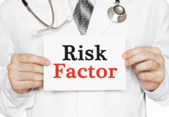Risk Factor Card In Hands Of Medical Doctor