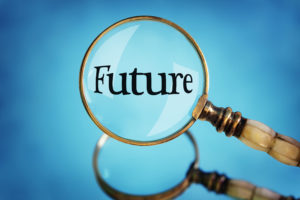 Magnifying glass focus on the word future concept for planning,