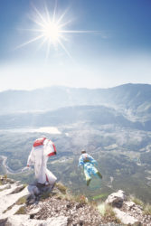 Two wingsuit pilots jumping off cliff from Monte Brento exit, Ar
