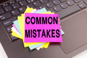 Writing Common Mistakes Text Made In The Office Close-up On Lapt