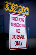 A dangerous intersection, crosswalk sign, safety, caution inform